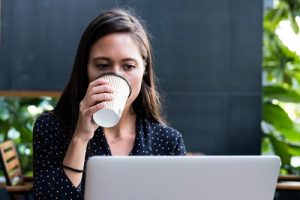 woman coffee laptop digital nomad